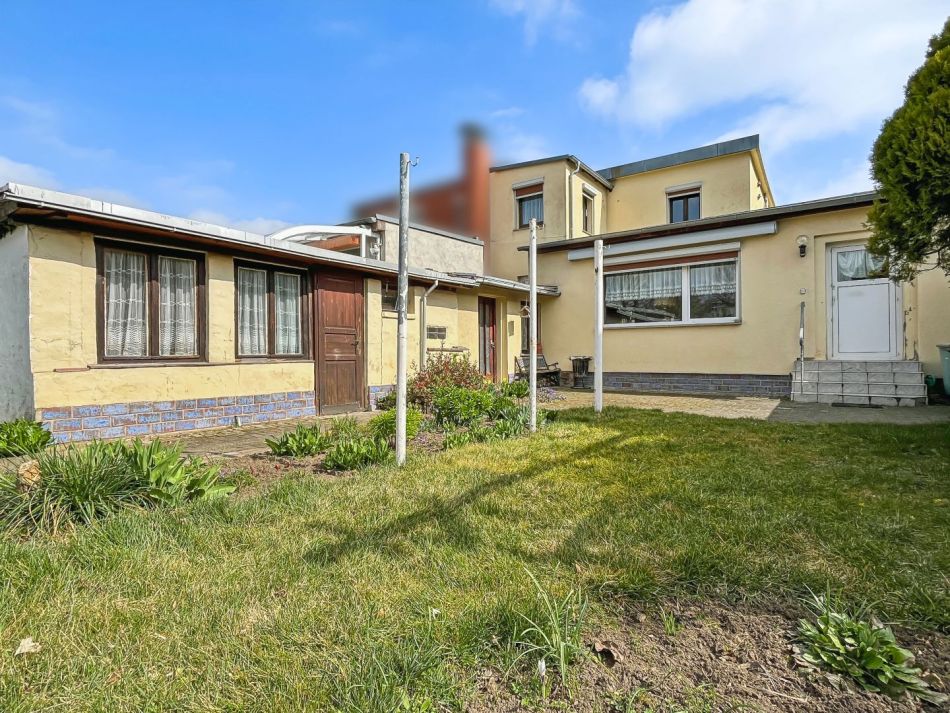 Immobilie in Köthen (Anhalt) - Endlich Platz für alle – familienfreundliche Doppelhaushälfte mit Garten und Garage - Bild 2