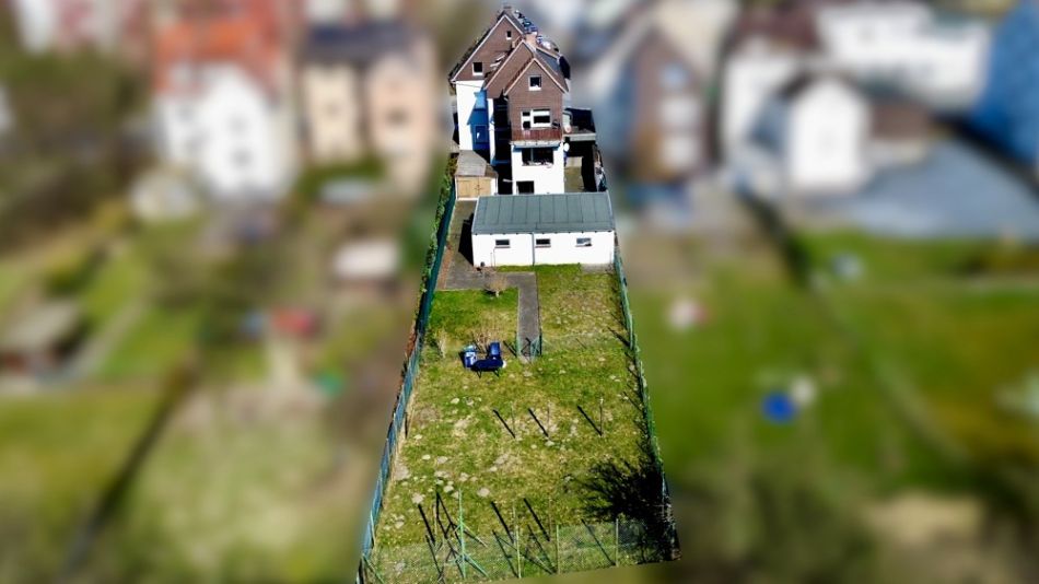Arnsberg-Hüsten: Vermietetes 3-Familien-Haus mit Garagen und Garten